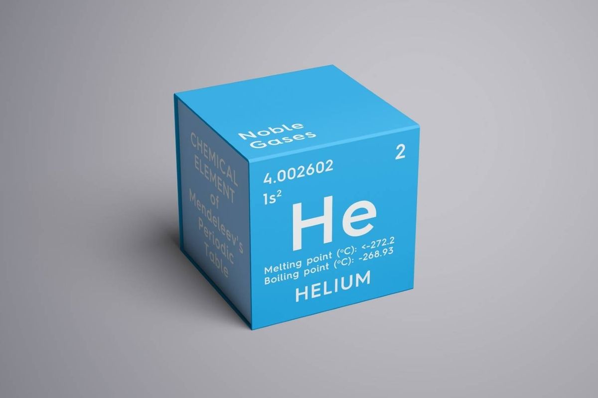 A blue cube features helium's element information with text reading: "Noble Gases, He, 4.002602, 1s², 2, HELIUM."