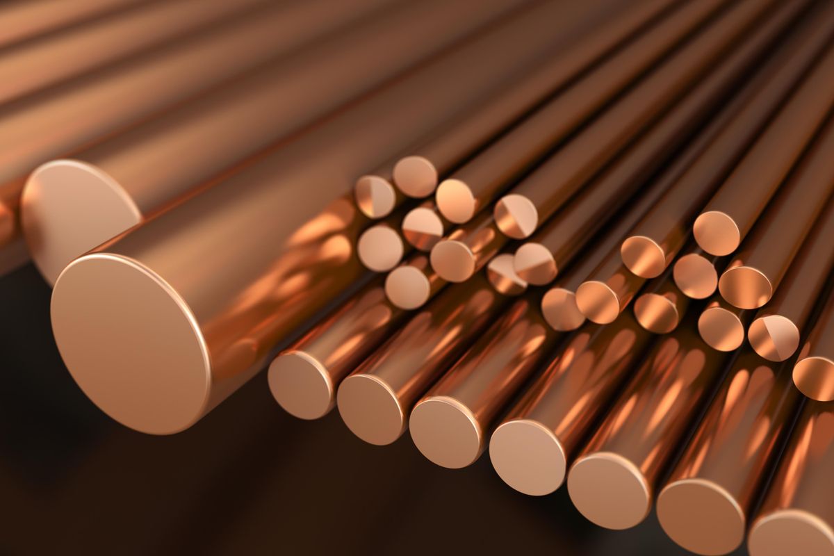 A closeup of the end of many copper cylinders of varying sizes.