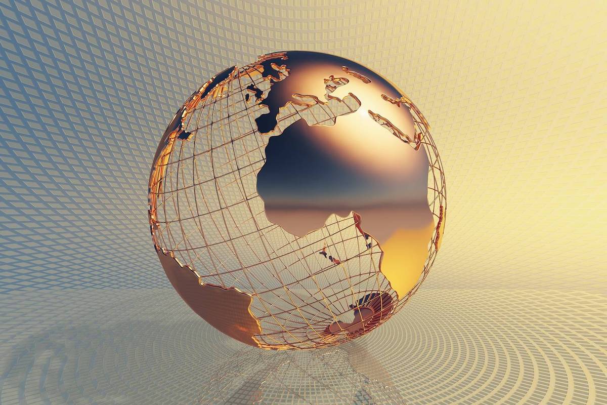 A copper-toned globe with a wireframe design sits on a reflective grid surface under a gradient gold sky.