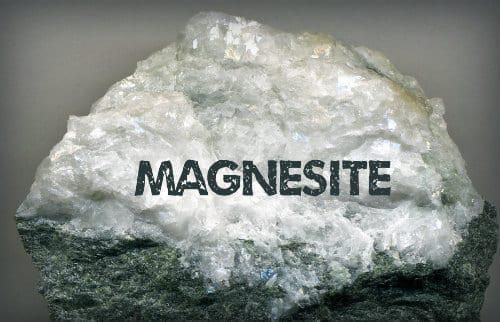 a piece of magnesite that says "magnesite" on the side