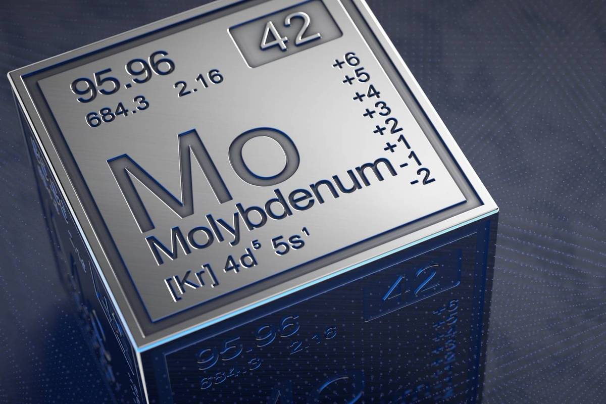 A shiny metal cube displays the element Molybdenum; text reads: 42, Mo, Molybdenum, with atomic details and symbols.
