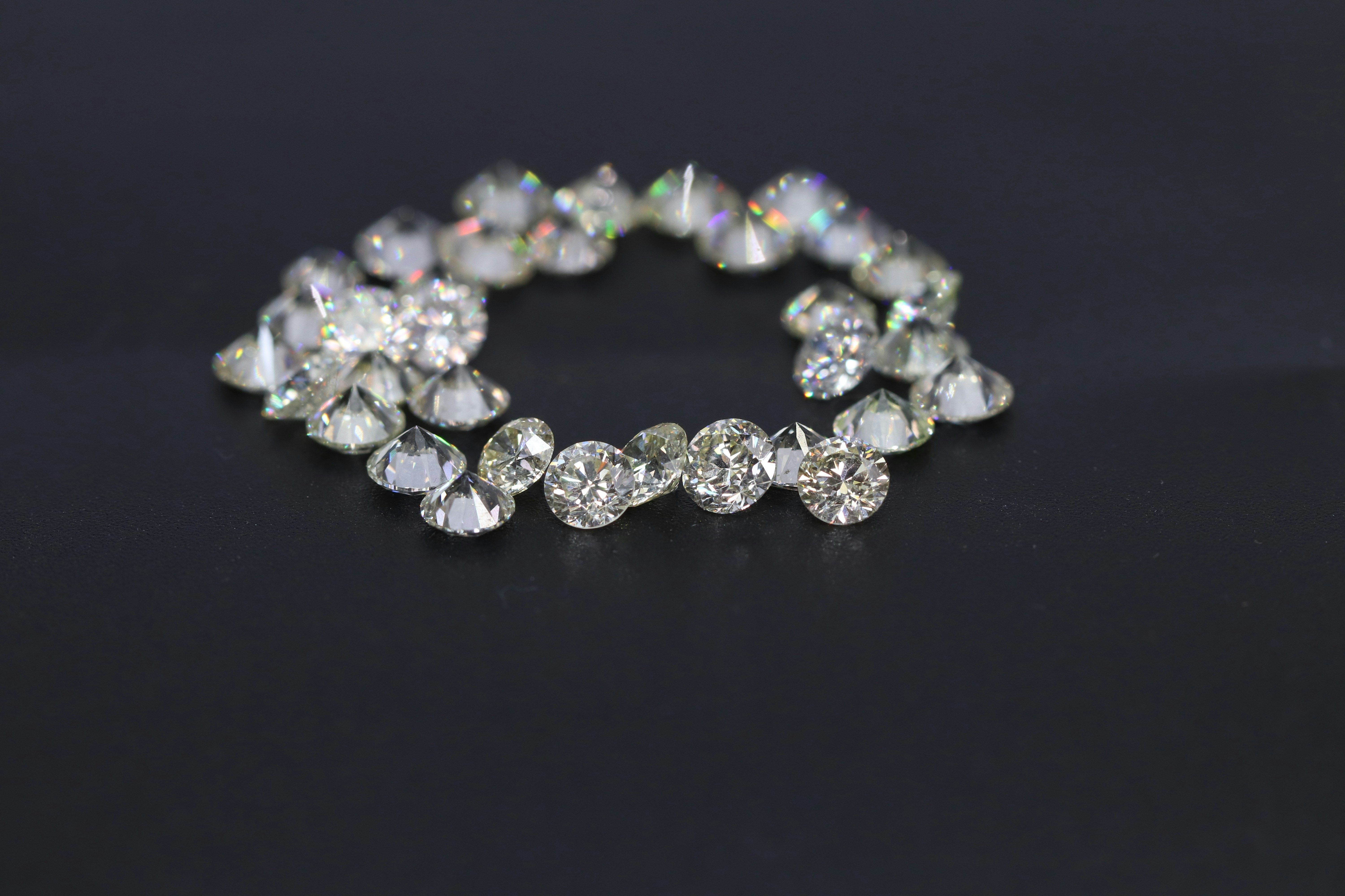 A small circle of white diamonds.