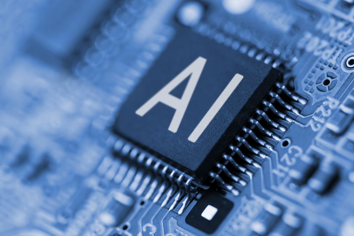 "AI" written on a computer chip.