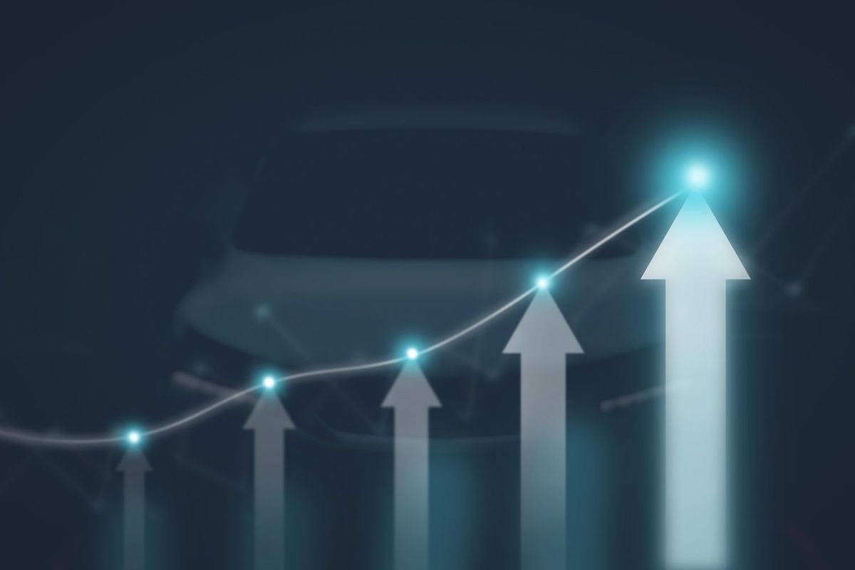 Arrows and line graph ascending, symbolizing growth, with a car silhouette in the background.