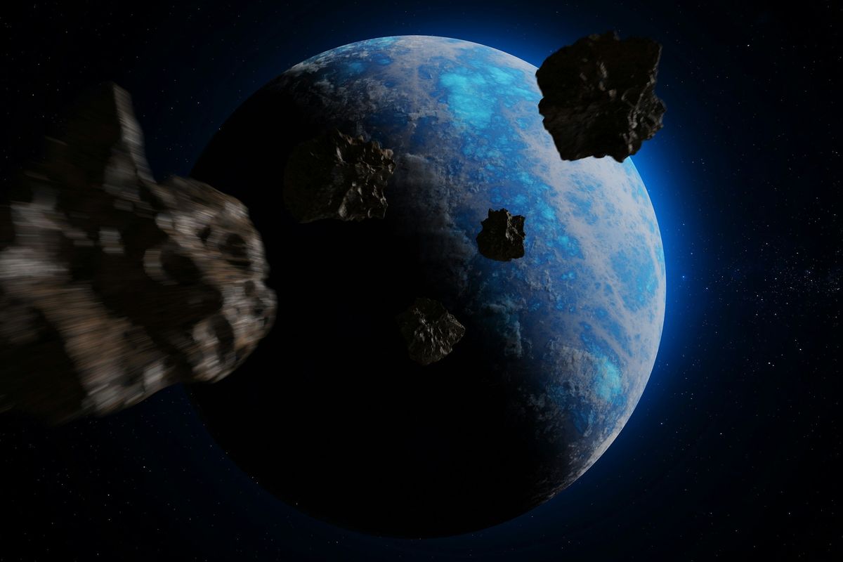 Asteroids with Earth in background.