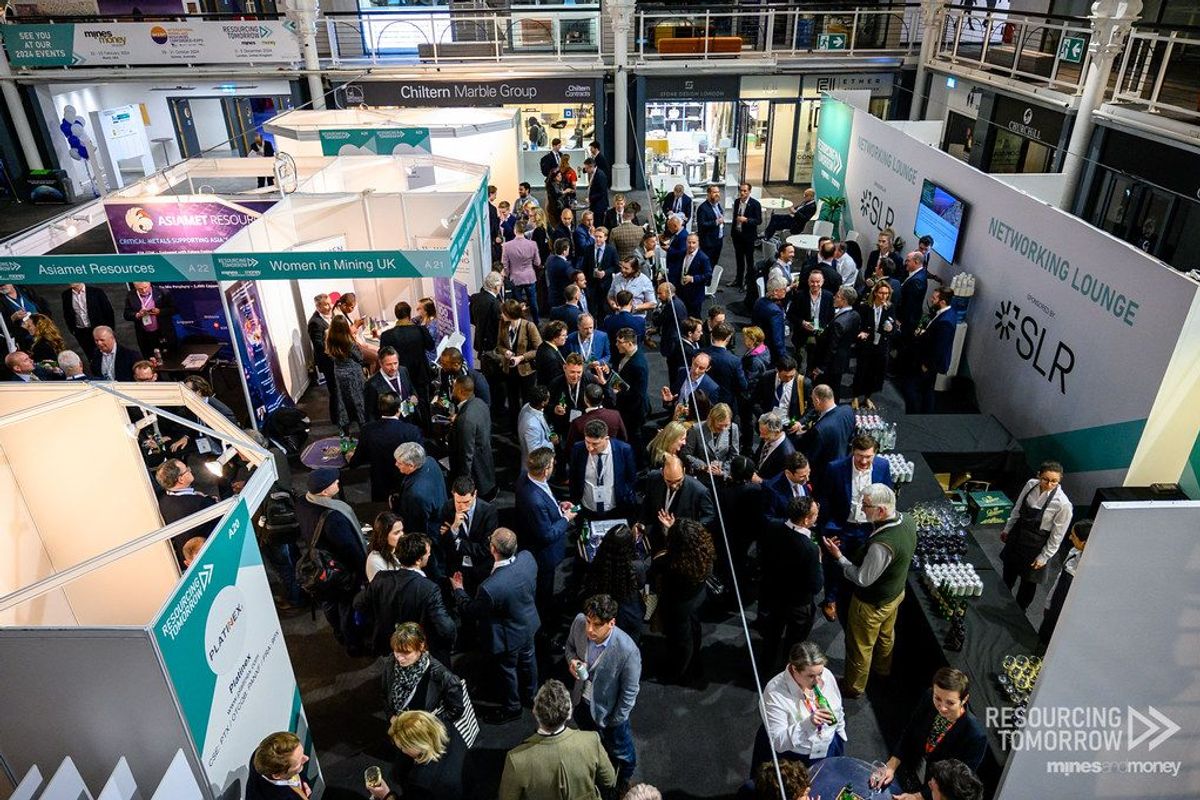 Attendees mingle around booths and Networking Lounge at Resourcing Tomorrow conference.