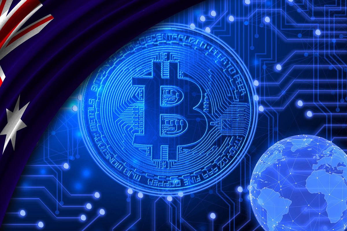 Australia flag draped over a Bitcoin.