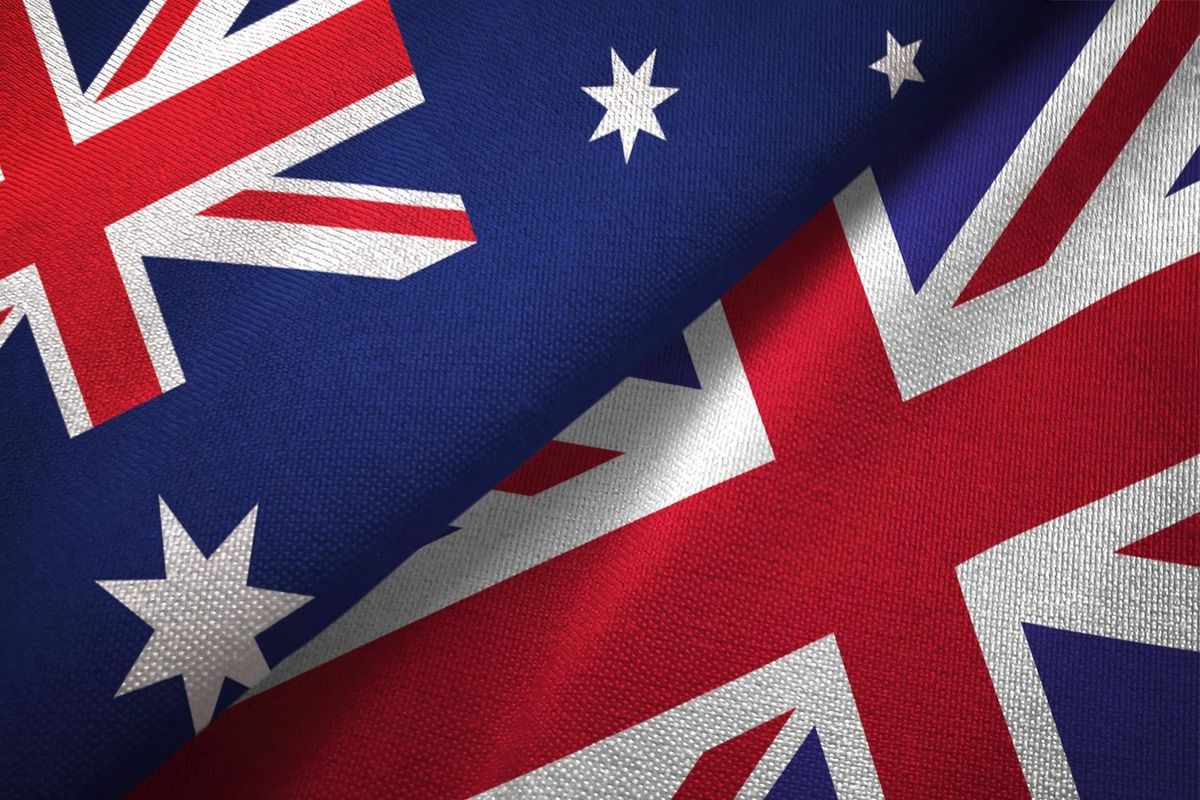 Australian and British flags overlapping closely.