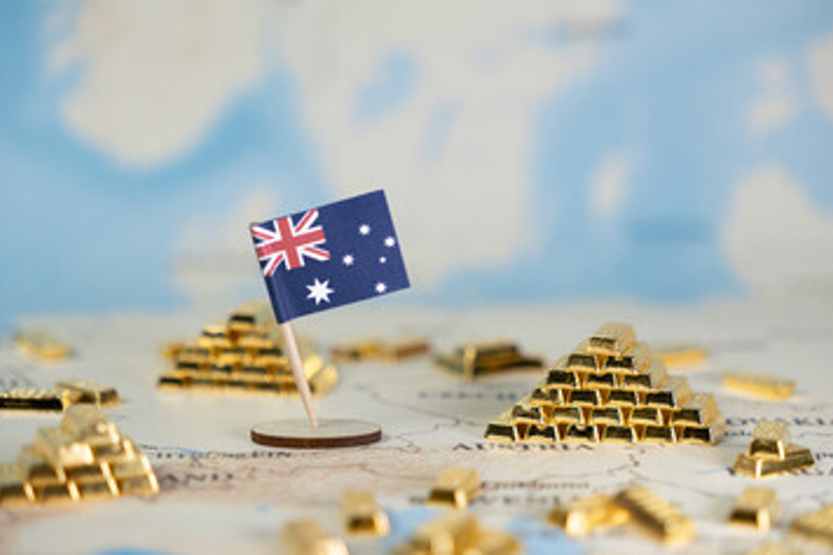 Australian flag and gold bars on a world map background.