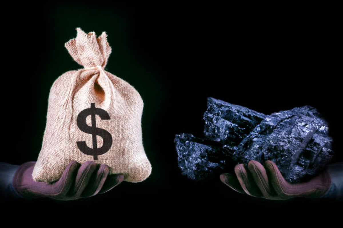 Bag of money and pieces of coal.