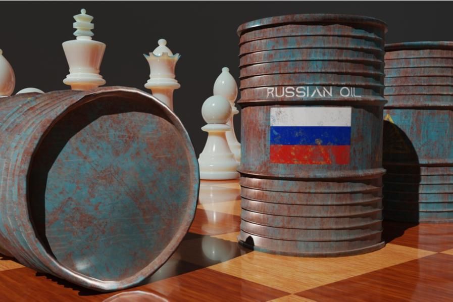 barrels of russian oil with chess pieces
