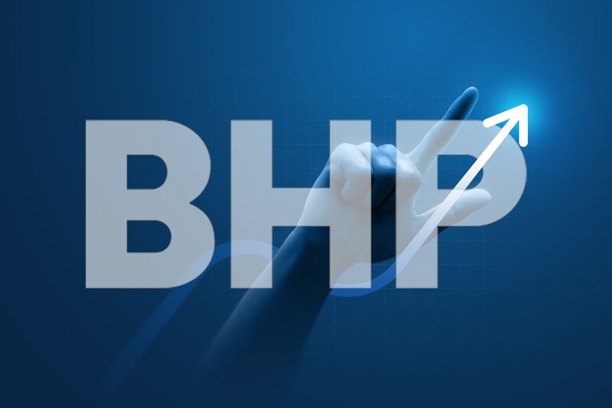 BHP logo overlaid on top of hand and arrow pointing up.