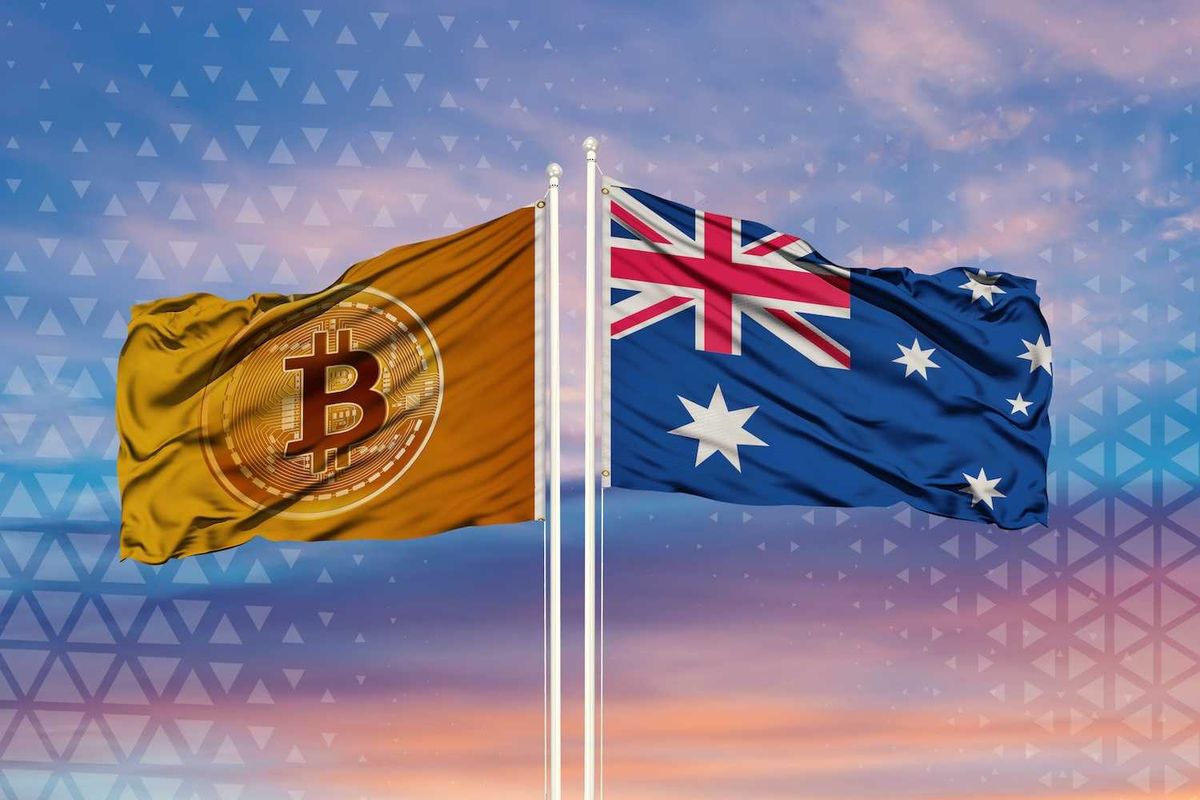 Bitcoin and Australian flags waving against a sunset sky.