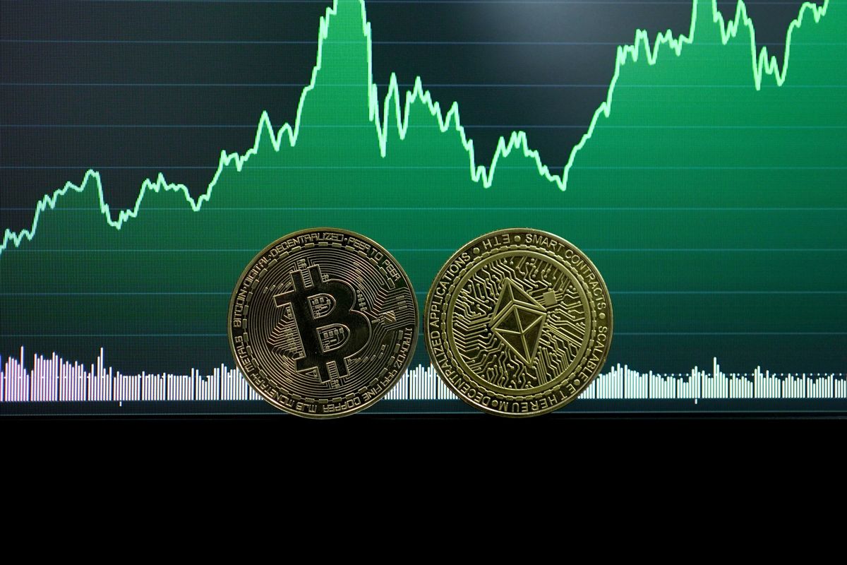 Bitcoin and Ethereum coins in front of a rising green financial graph.