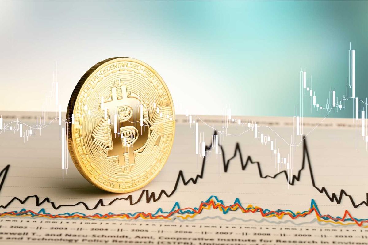 Bitcoin overlaid on fluctuating financial chart background.