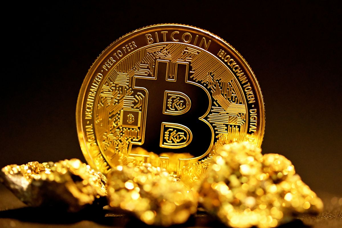 Bitcoin surrounded by gold nuggets on a dark background.