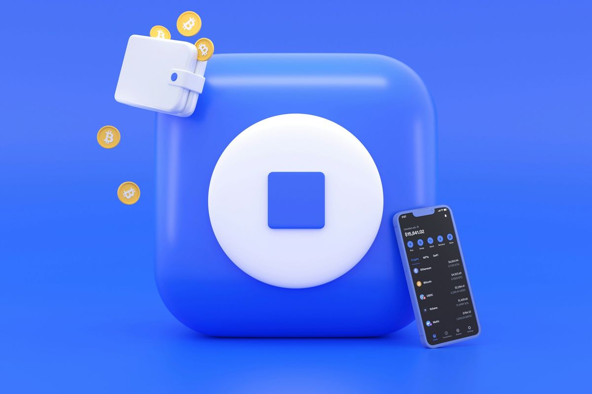 Blue digital wallet icon, Bitcoin coins and smartphone app on a blue background.