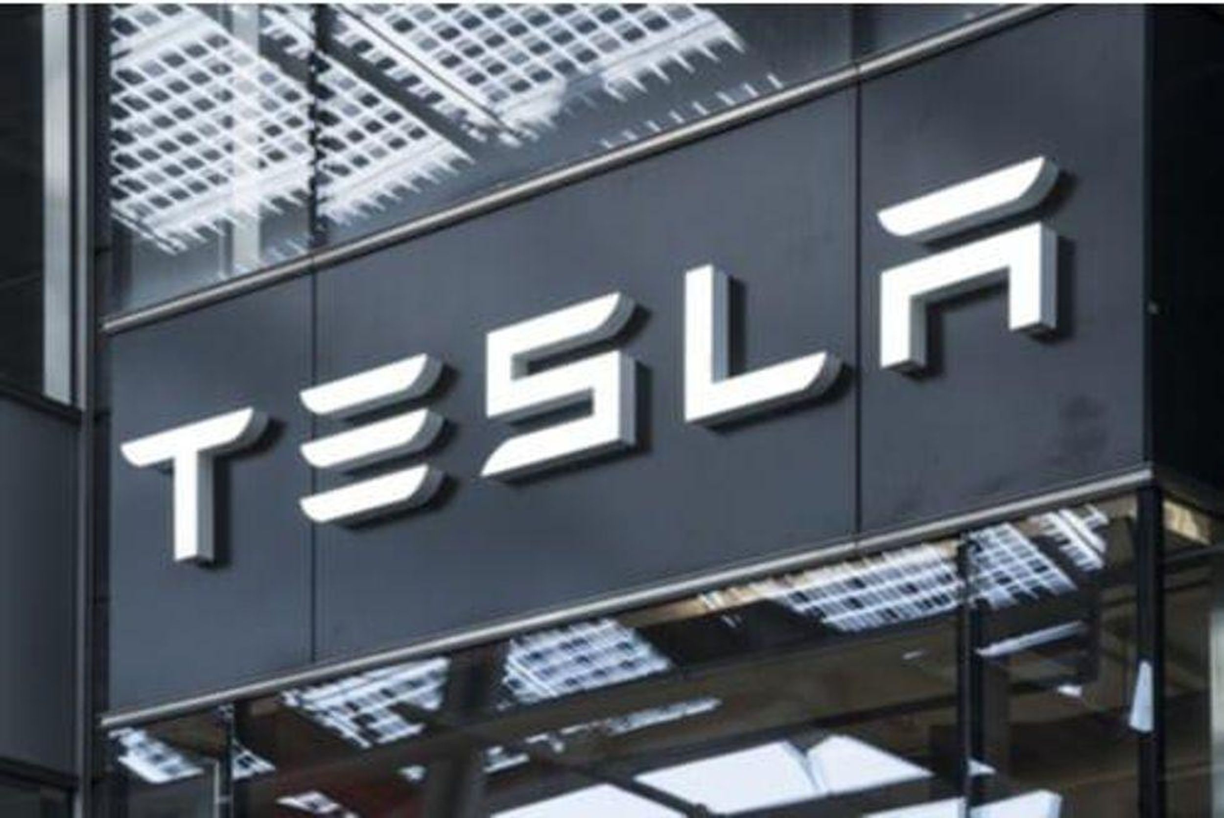 building with "tesla" on front