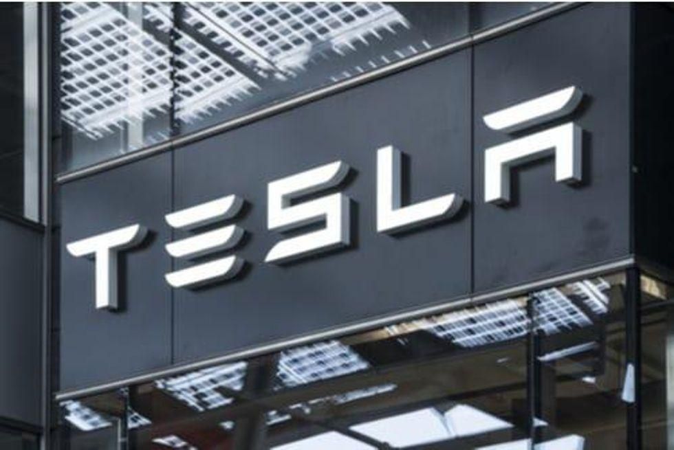 building with "tesla" on front