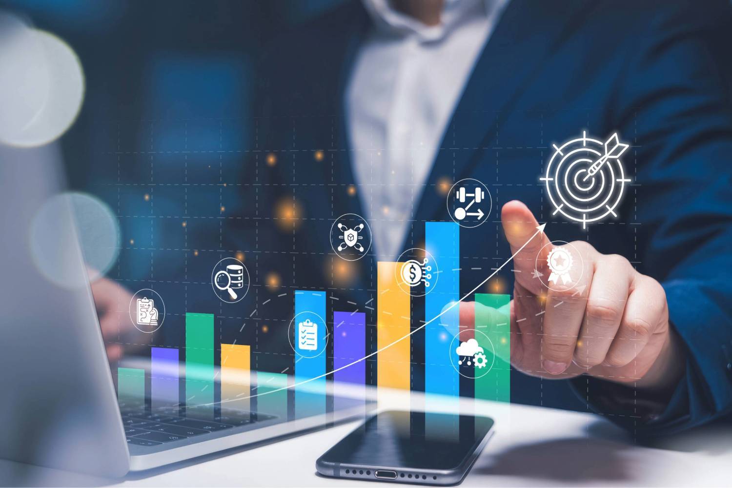 Businessman on laptop with chart visualization.