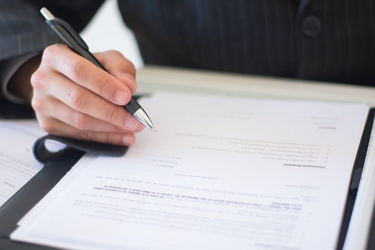 businessman signing contract