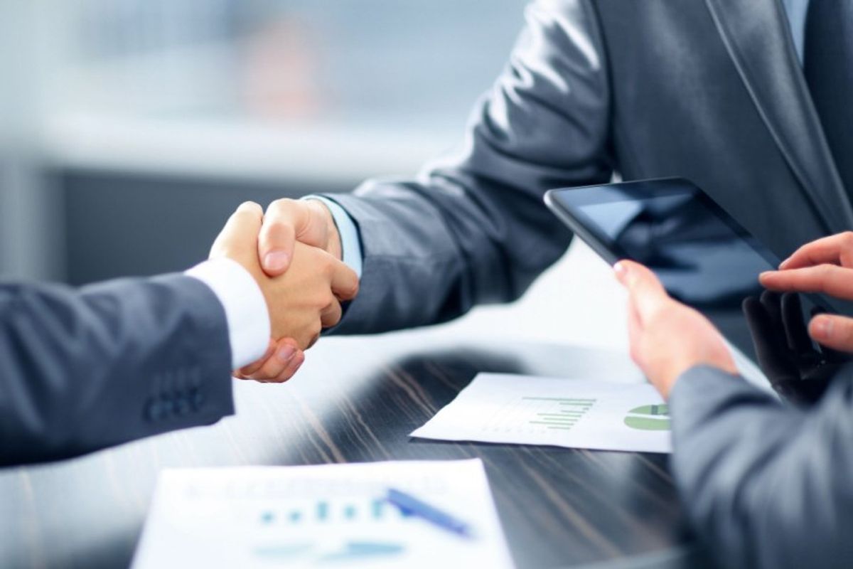 Businessmen shaking hands.