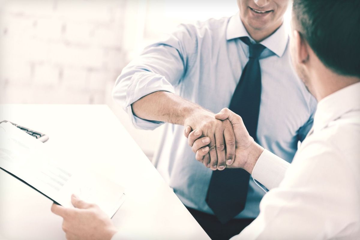 Businessmen shaking hands.