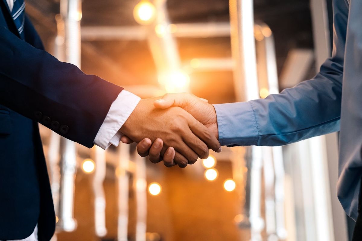 Businessmen shaking hands.