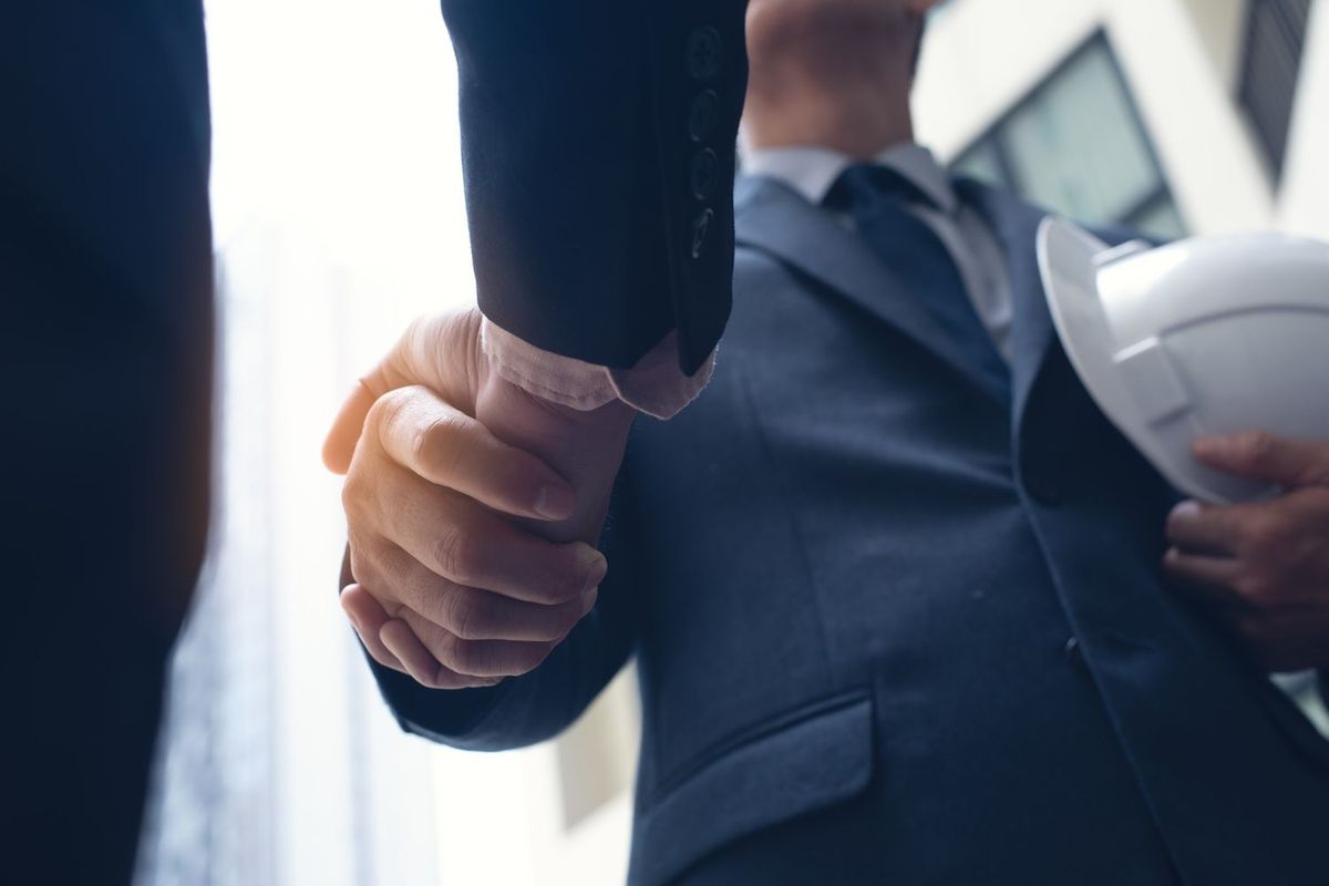 Businessmen shaking hands.