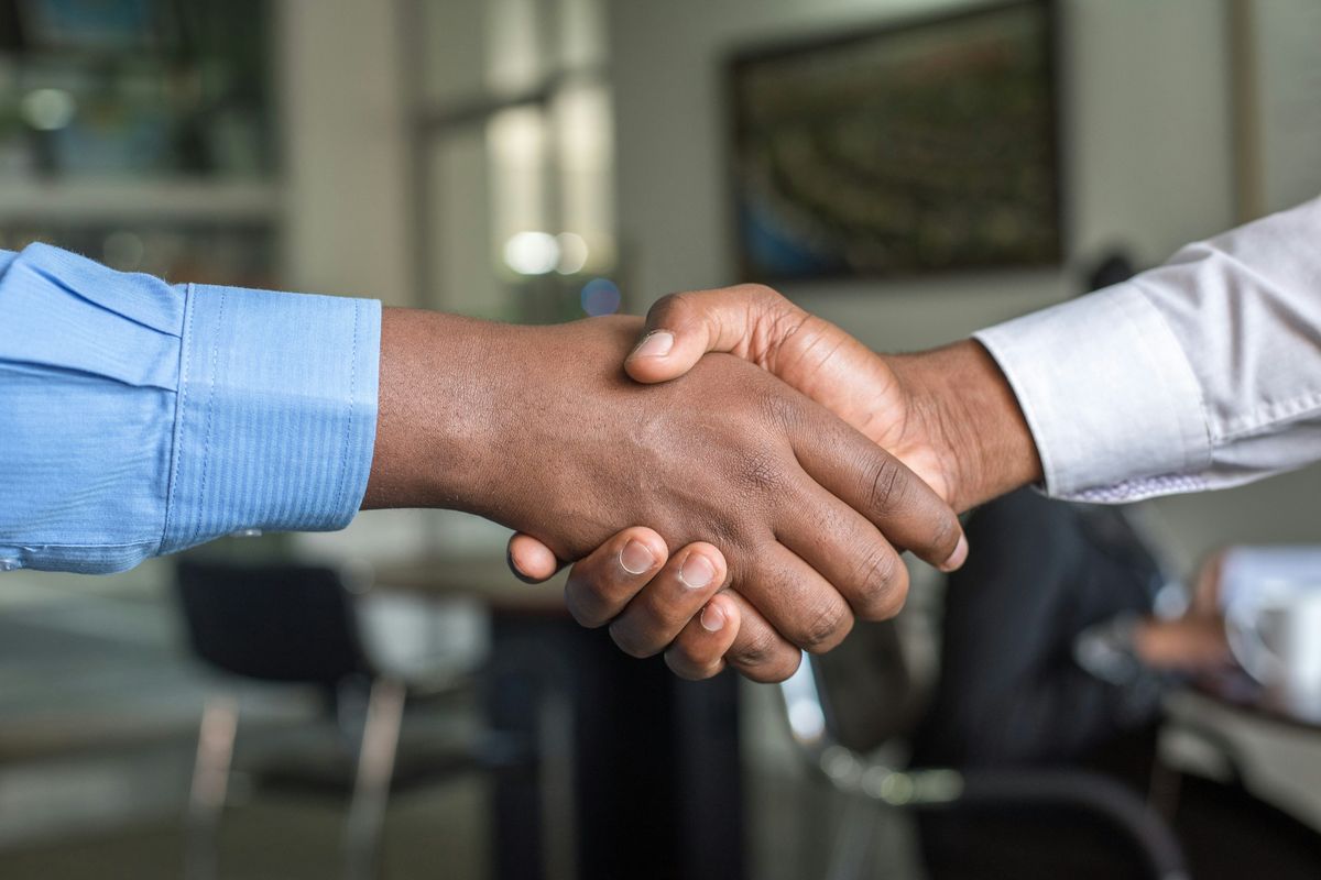 Businessmen shaking hands.