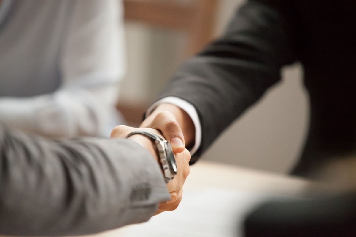 Businessmen shaking hands.