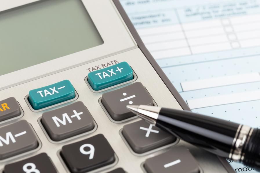 calculator with pen and paper