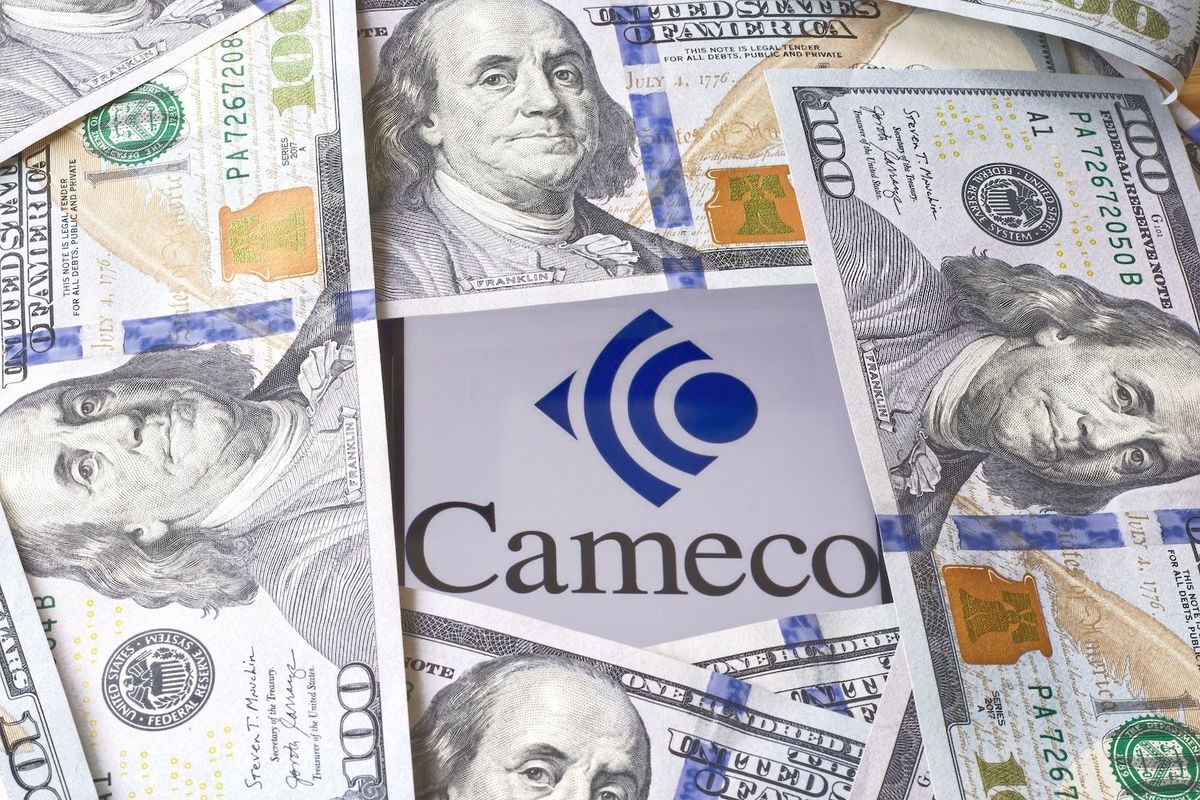 Cameco logo surrounded by US dollars.