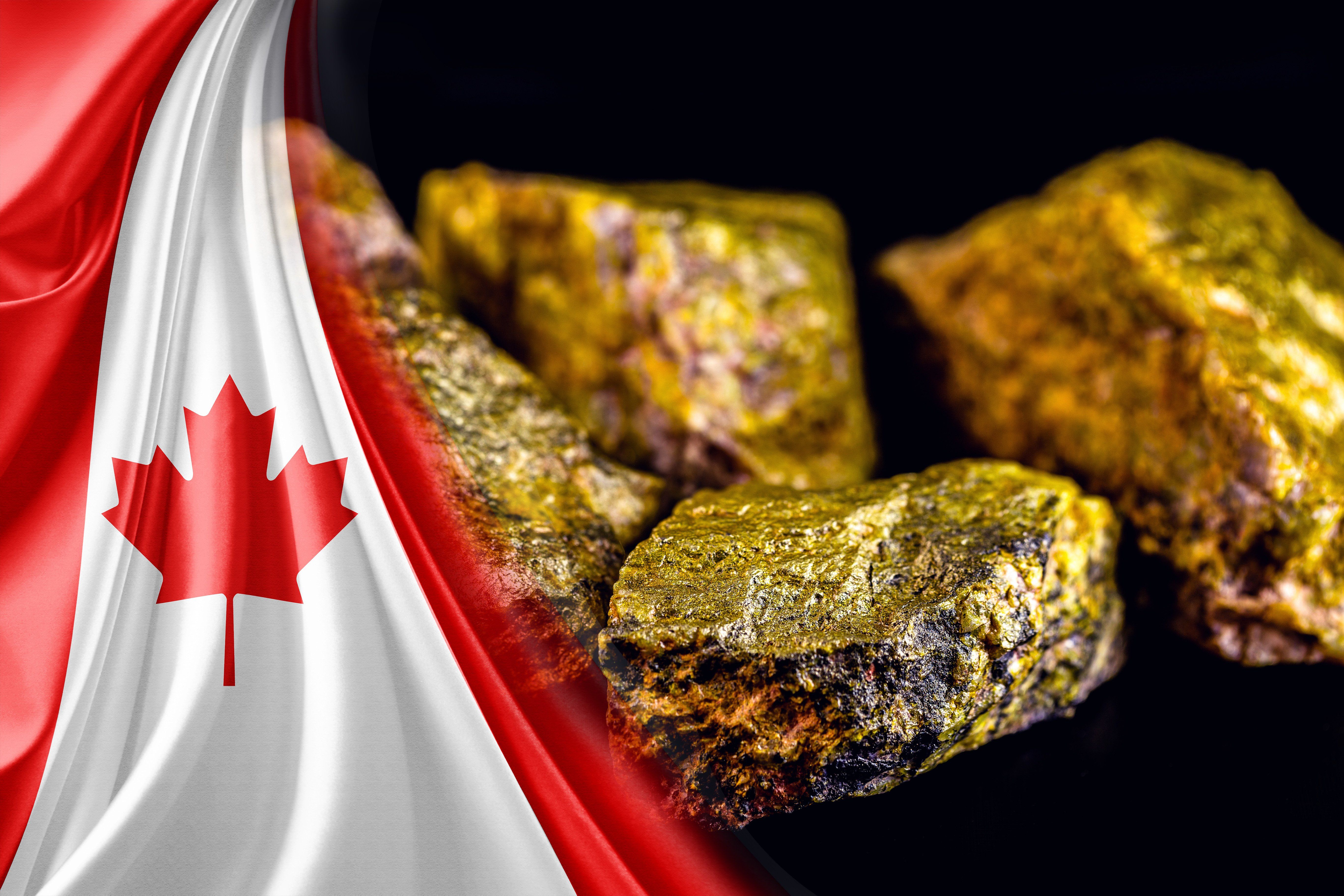 Canadian flag next to uranium ore.