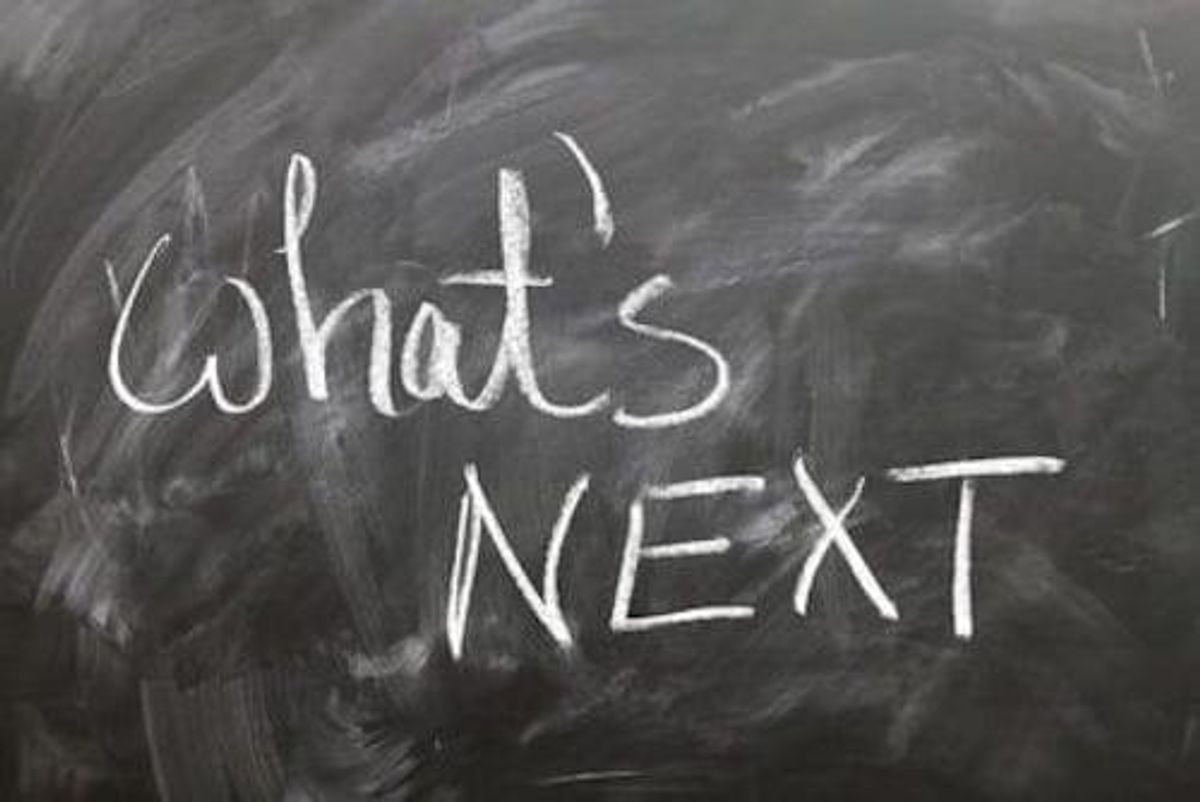 chalkboard with words "what's next"