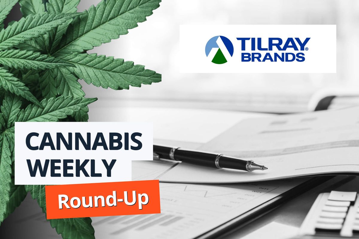 Charts and pen on desk, Tilray Brands logo.