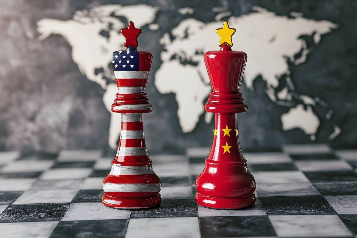 Chess pieces painted with American and Chinese flags on a checkered board, world map in the background.