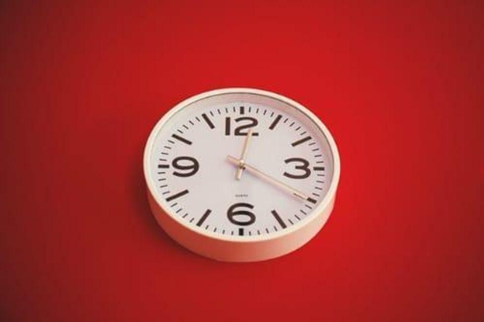 clock on red background