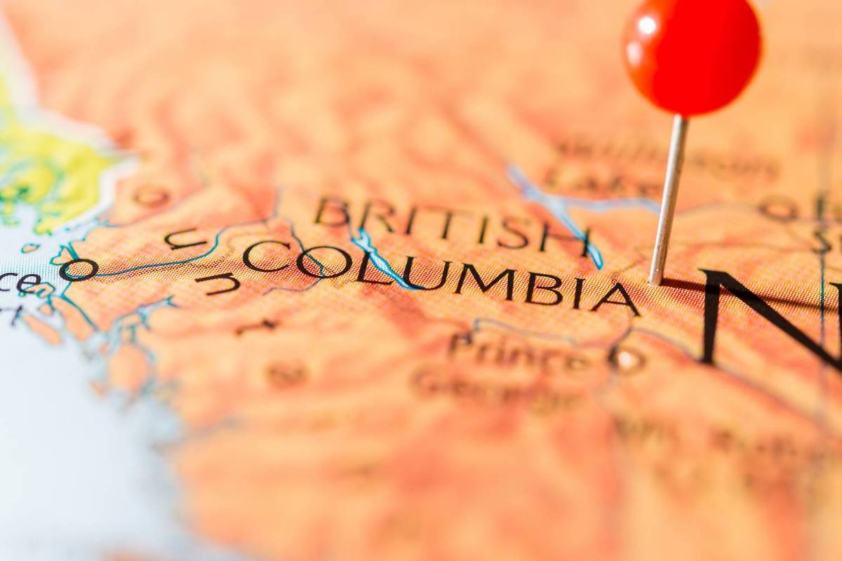 Close-up of a map showing British Columbia with a red pin marking a location, text reads: British Columbia.