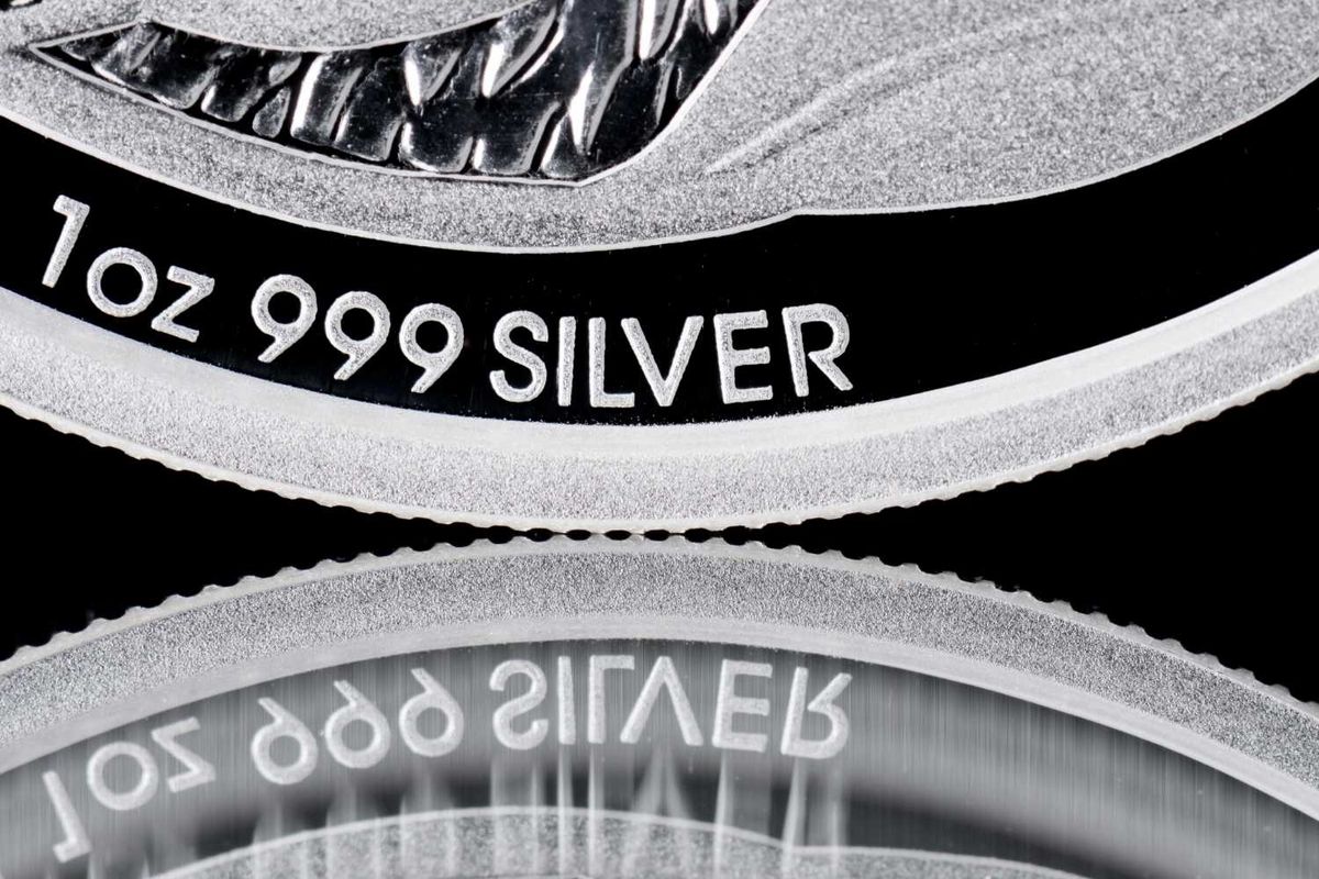 Closeup of a silver coin edge.