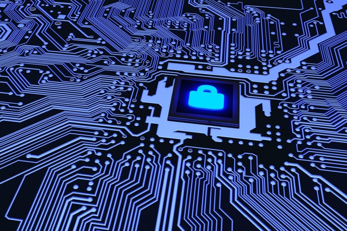 Closeup of blue circuit board with a blue lock symbol in the center.