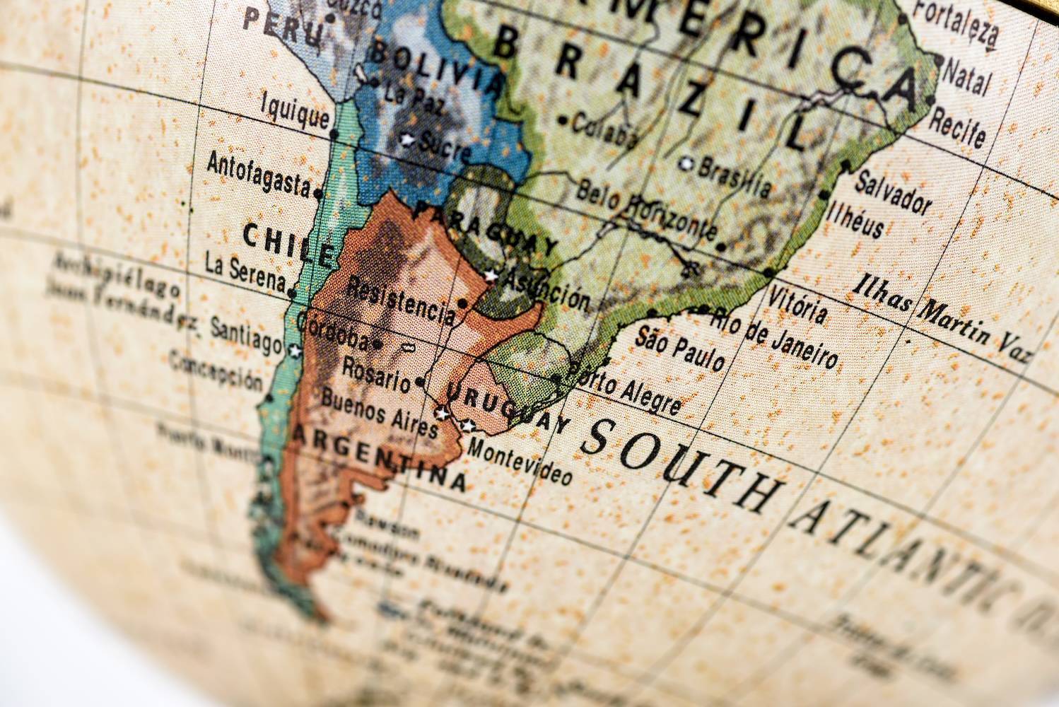 Closeup of globe showing South America with countries like Brazil, Argentina and Chile.