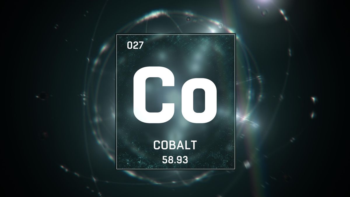 Cobalt symbol over glowing light pattern.
