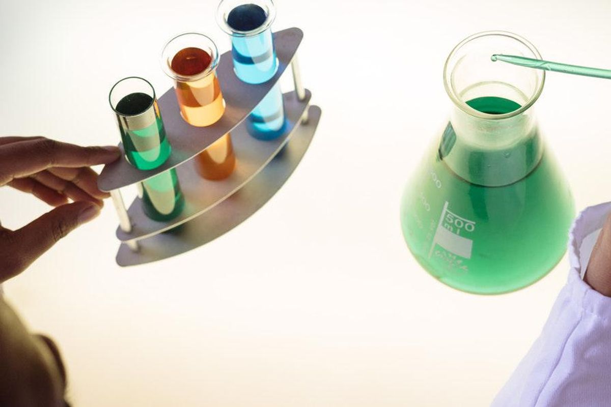 colored test tubes and beaker