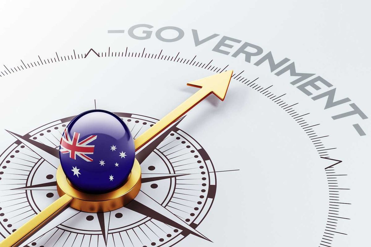 Compass with Australian flag pointing to "government."