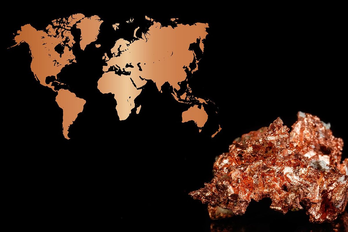 Copper ore in foreground, with world map showing countries in copper on black background.