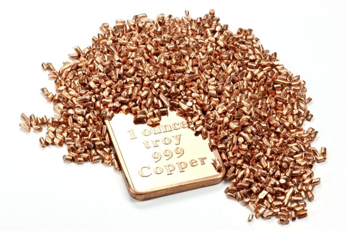 copper ounce surrounded by copper pellets