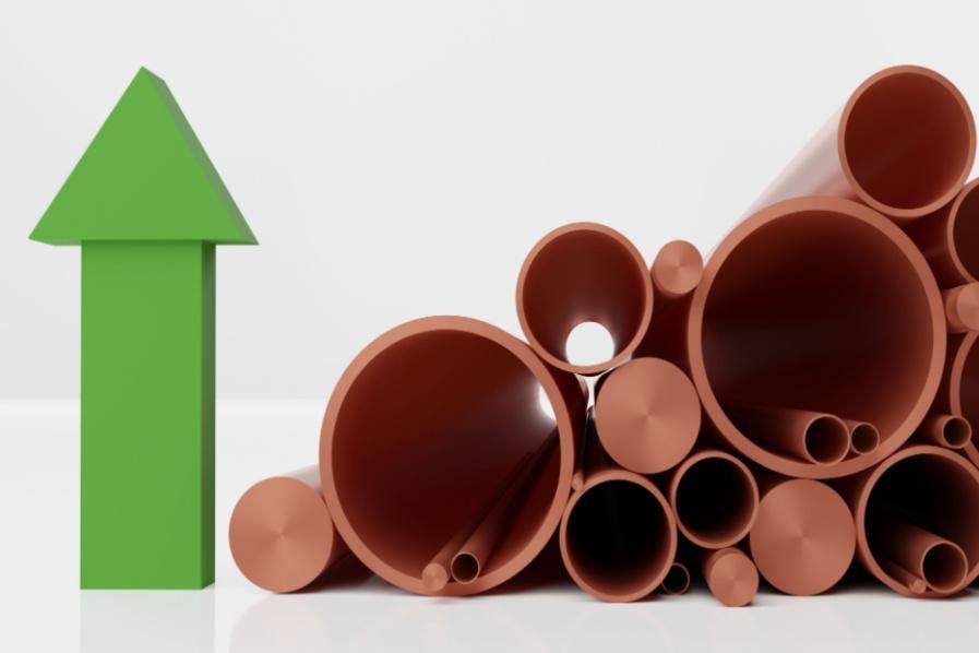 copper pipes with green up arrow