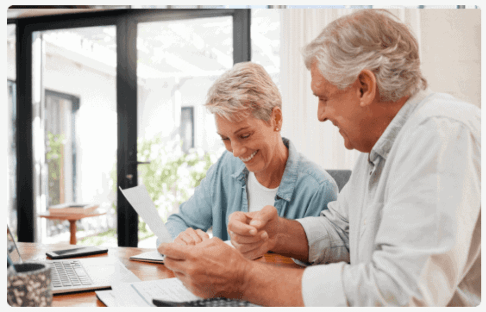 Couple opening a gold IRA with Allegiance Gold