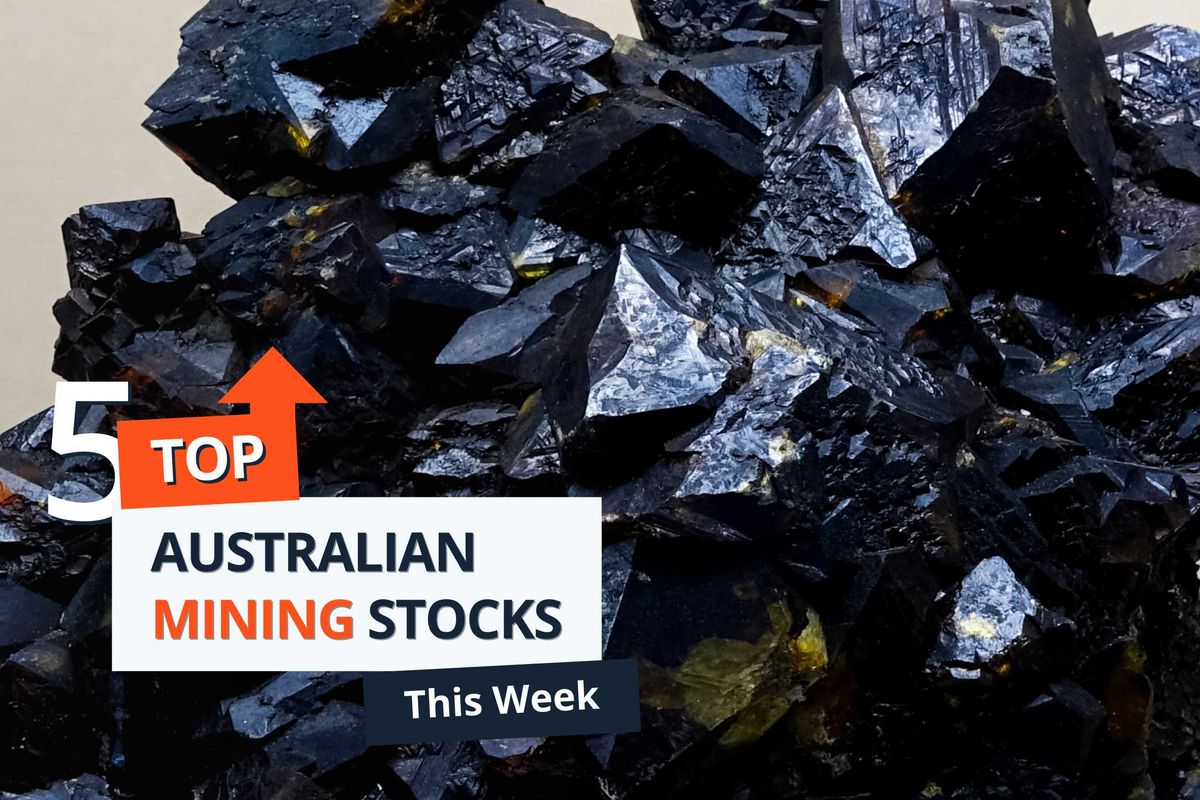 Dark, jagged rock formation with shiny, reflective surfaces.